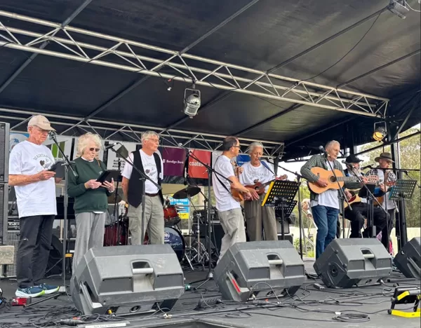 Our Mens Shed on stage at Coolum
